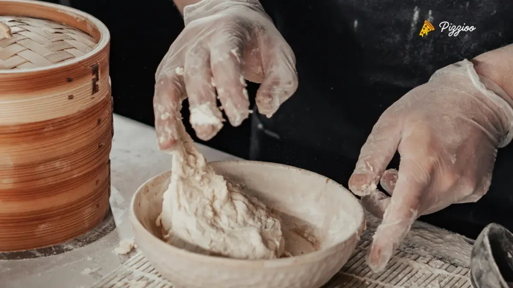 Pizza Dough Too Sticky and Wet: Causes, Fixes & Prevention pizza dough too sticky
